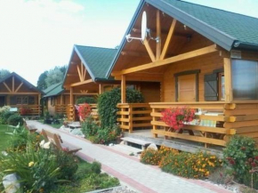 Gemütliches Holzferienhaus in Gmina Postomino